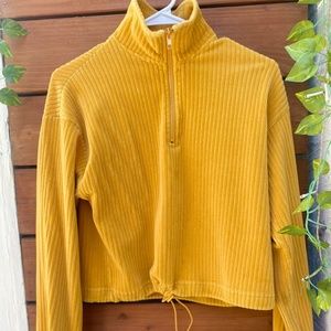 Woman’s velvet mustard pullover